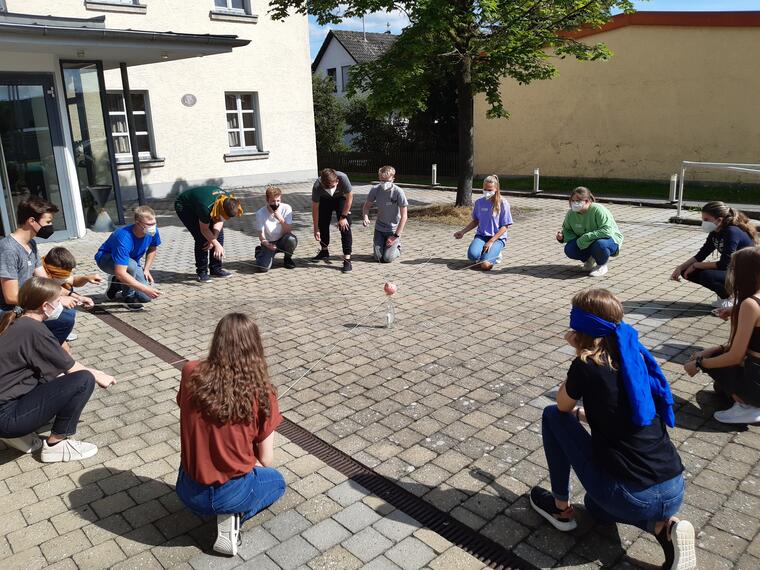 Gruppe bei einem Kooperationsspiel